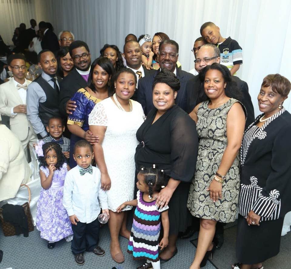 Bishop G. F. Austin III surrounded by extended family